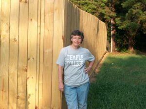 Me by my fence back in Texas